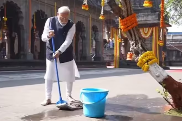 PM Modi cleans temple premises